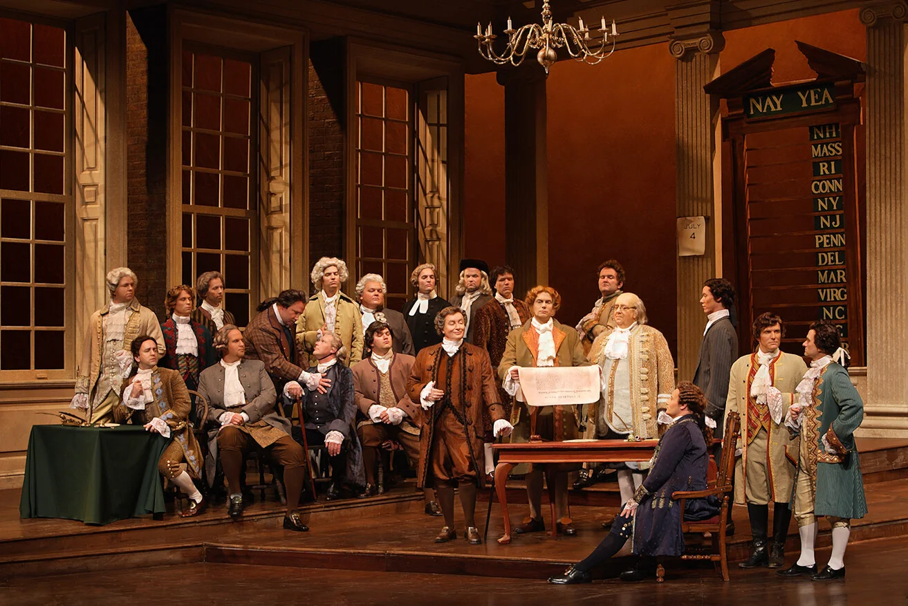Theater actors on stage during performance of the musical production 1776